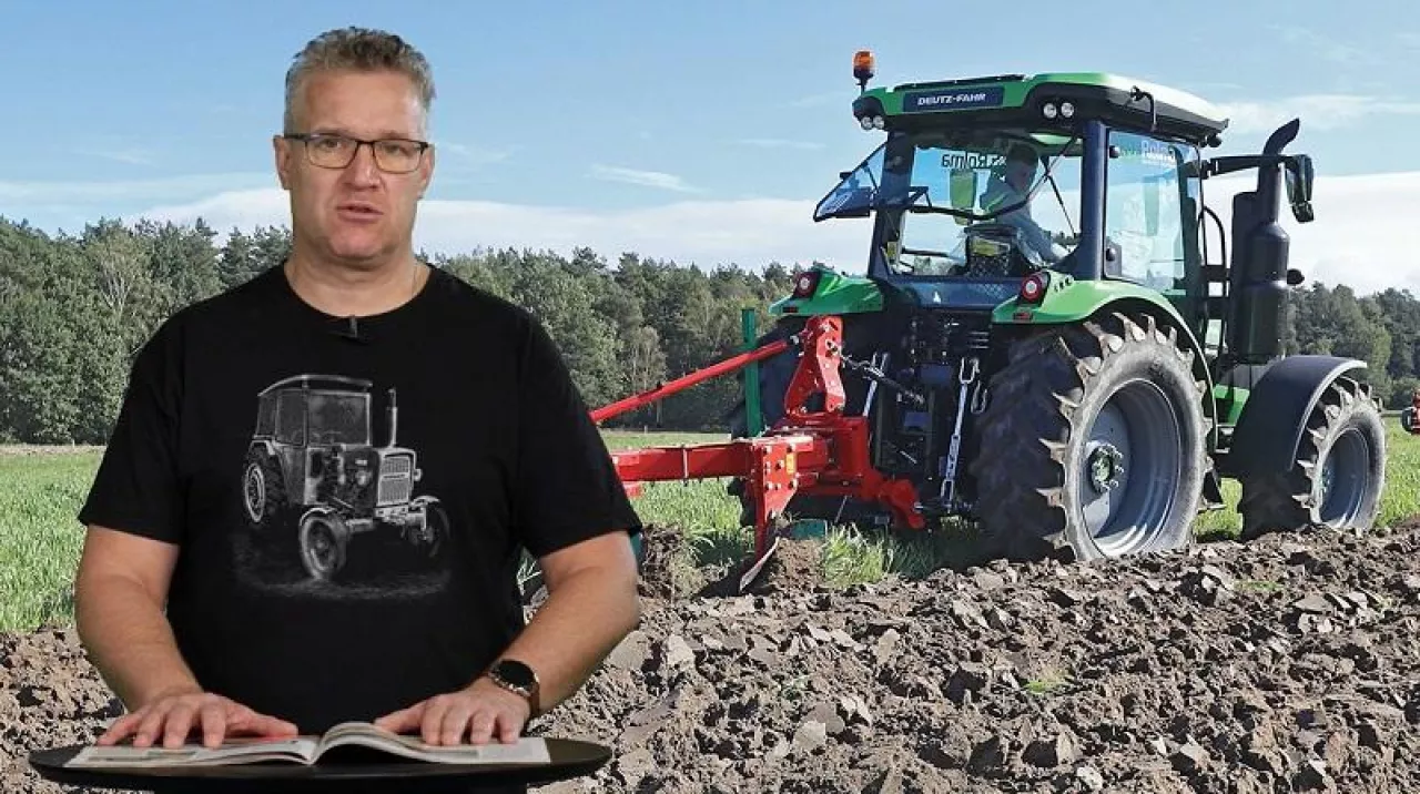 A small organic dairy farm with a mixed herd of cows and goats. Dairy building with large wheels of cheese maturing.