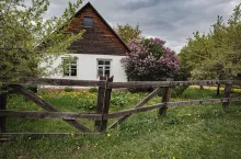 Rustic landscape in spring, small village house in Kolomenskoye park, Moscow, Russia.