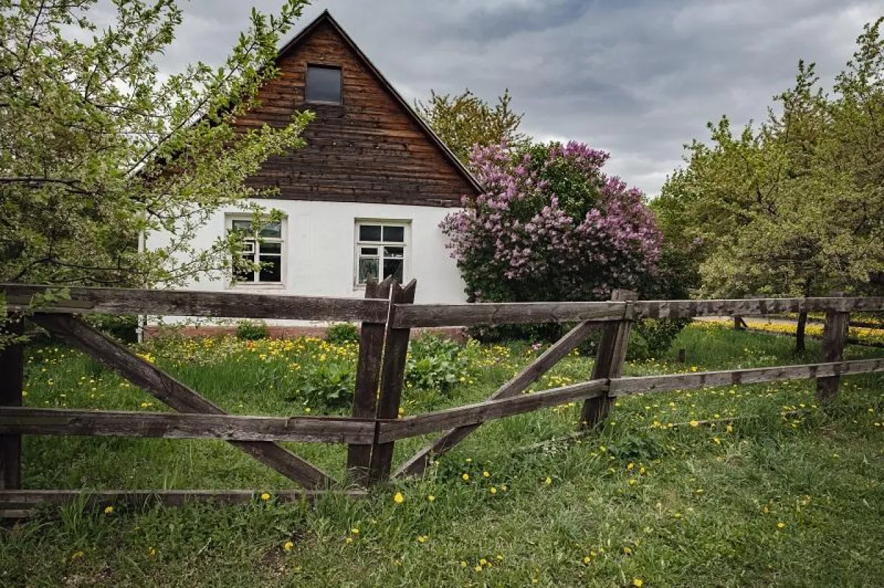 Rustic landscape in spring, small village house in Kolomenskoye park, Moscow, Russia.