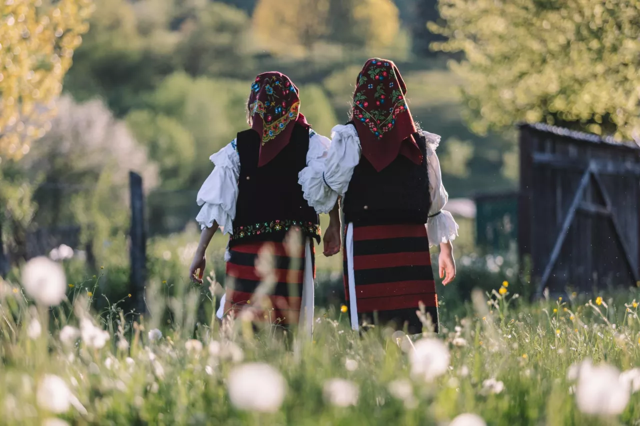 Grandmother with daughter and granddaughter on the farm. Female family portrait