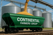 Wagon zbożowy oznaczony logotypem Continental Farmers Group podczas załadunku przy silosach. Firma należy do saudyjskiego funduszu SALIC i eksportuje zboże z Ukrainy do UE