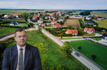 Minister rolnictwa Stefan Krajewski na tle wsi