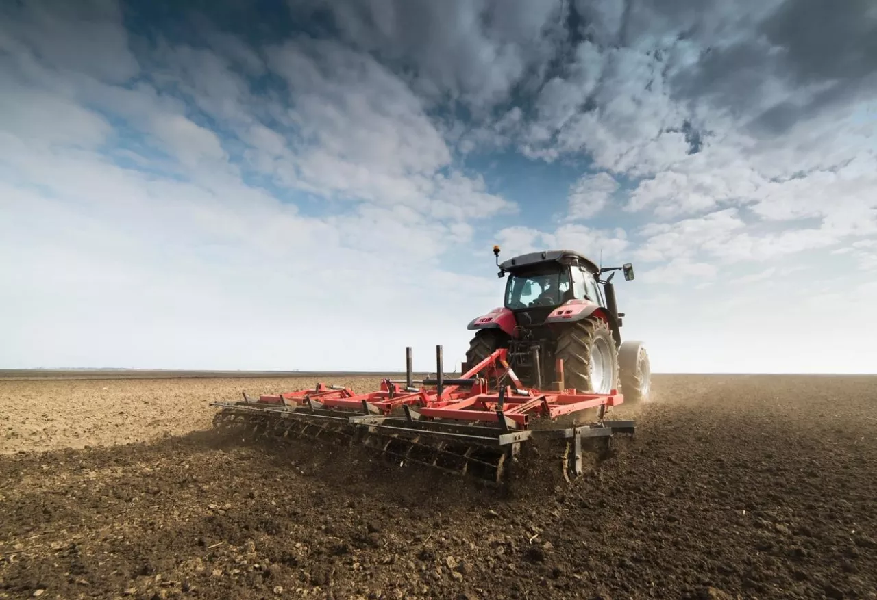 Tractor preparing land for sowing