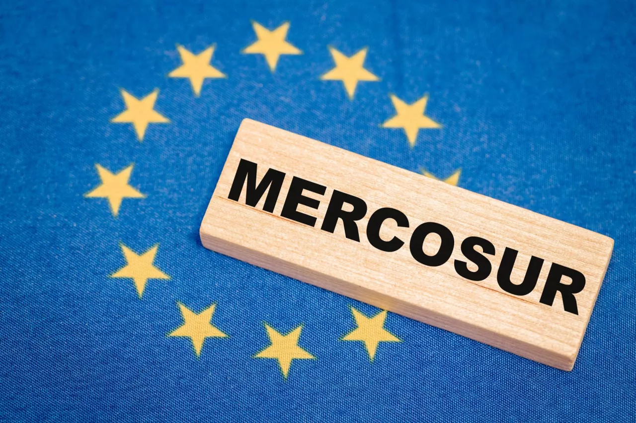 The flag of the European Union and the word Mercosur in the background. A financial and business concept. A trade agreement between the countries of the South and the European Union